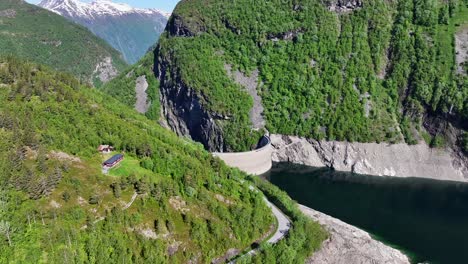 The-dam-Zakariasdammen-in-Tafjord,-Norway,-a-double-curved-concrete-arch-dam,-completed-in-1968,-at-95-meters-it-was-Northern-Europe's-tallest-of-its-kind