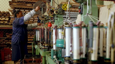 female worker working in rope making industry 4k