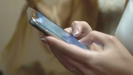 girl works on the internet using a smartphone close-up