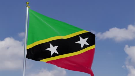 flag of saint kitts and nevis moving in the wind with a clear blue sky in the background, clouds slowly moving, flagpole, slow motion