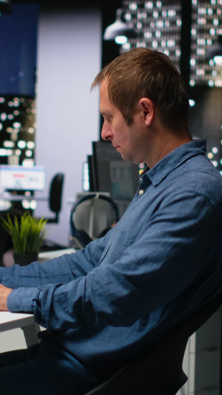 Vertical Video Male employee creates 3D render of an apartment interior using blueprints