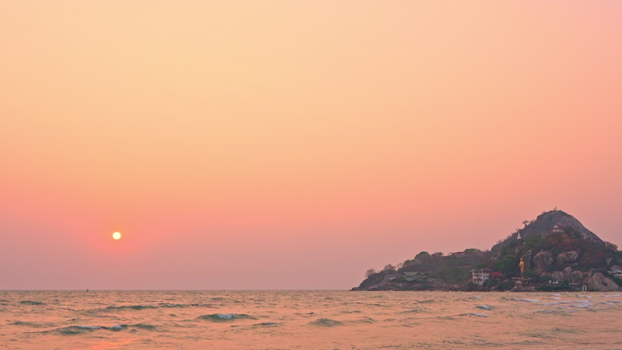 Amazing golden hour sunset at the shore with beautiful sky