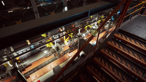 conveyor system in operation at a modern factory during daylight hours