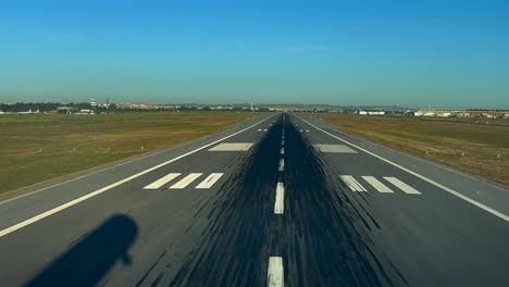 silhouette of a modern jet over the runway in a real time landing