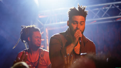 singer performing on stage 4k