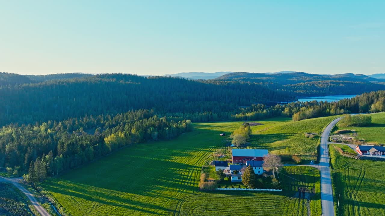 Countryside Landscape With Fields, Forests, And Lake In Norway - Aerial Drone Shot