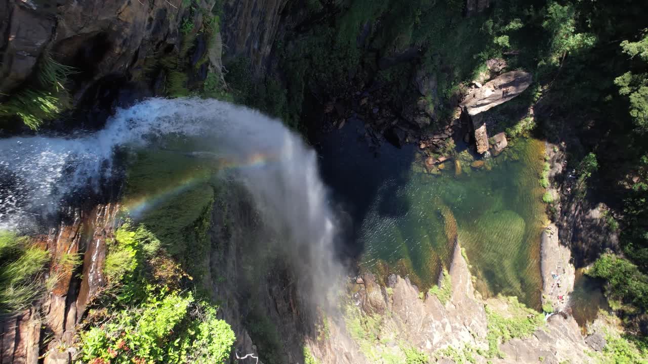 Stunning Aerial View of a Waterfall and its Pool