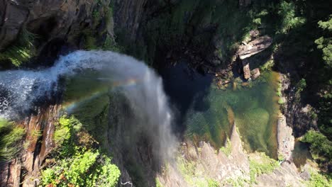stunning aerial view of a waterfall and its pool