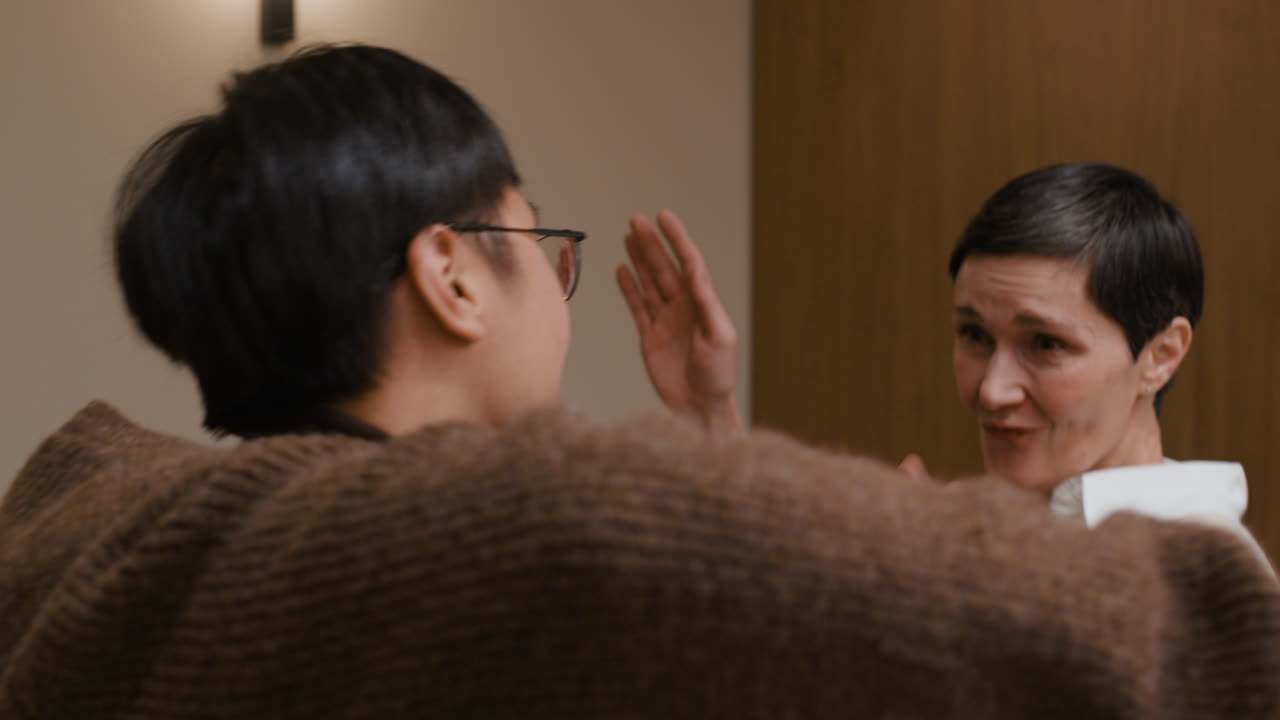 Image of people interacting indoors