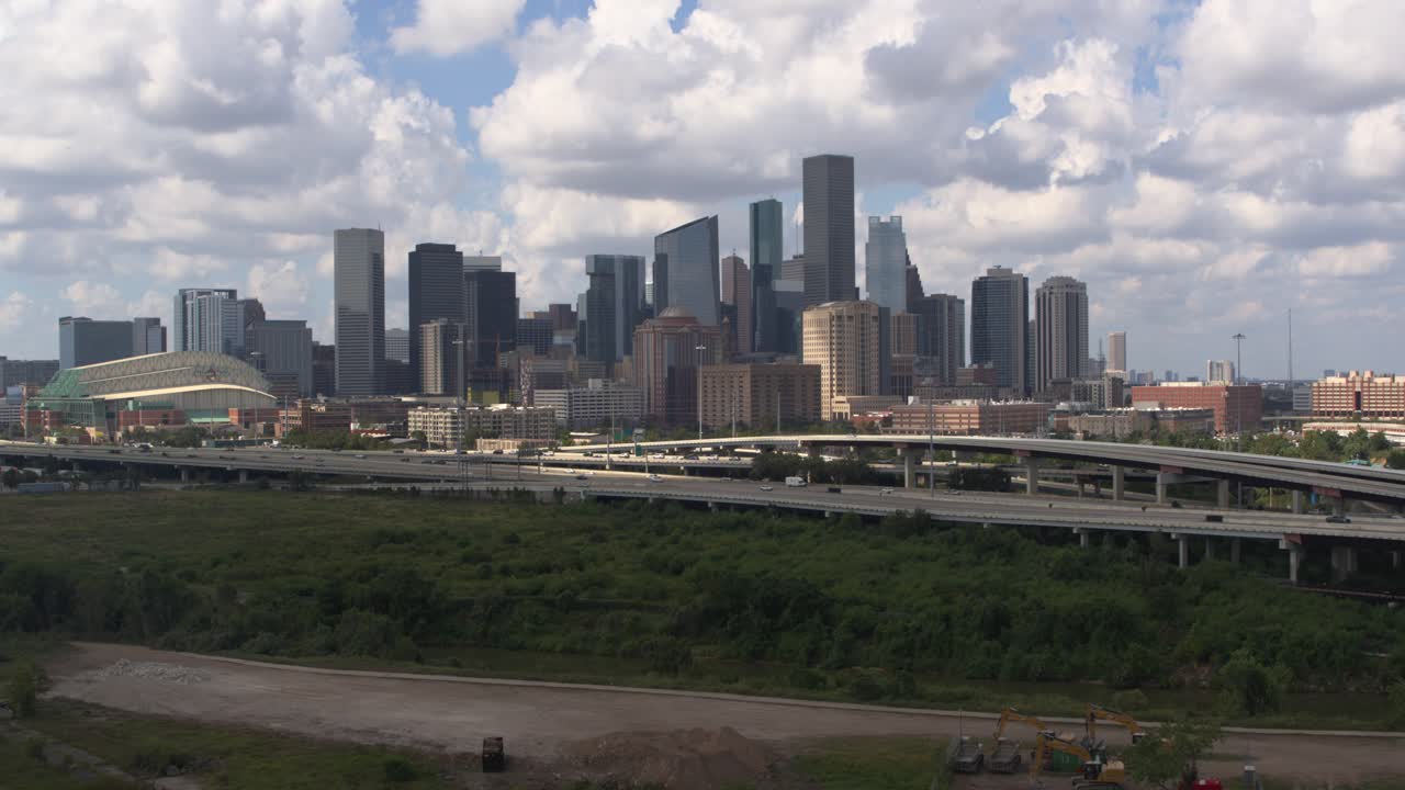 Establishing drone shot pulling away from downtown Houston, Texas
