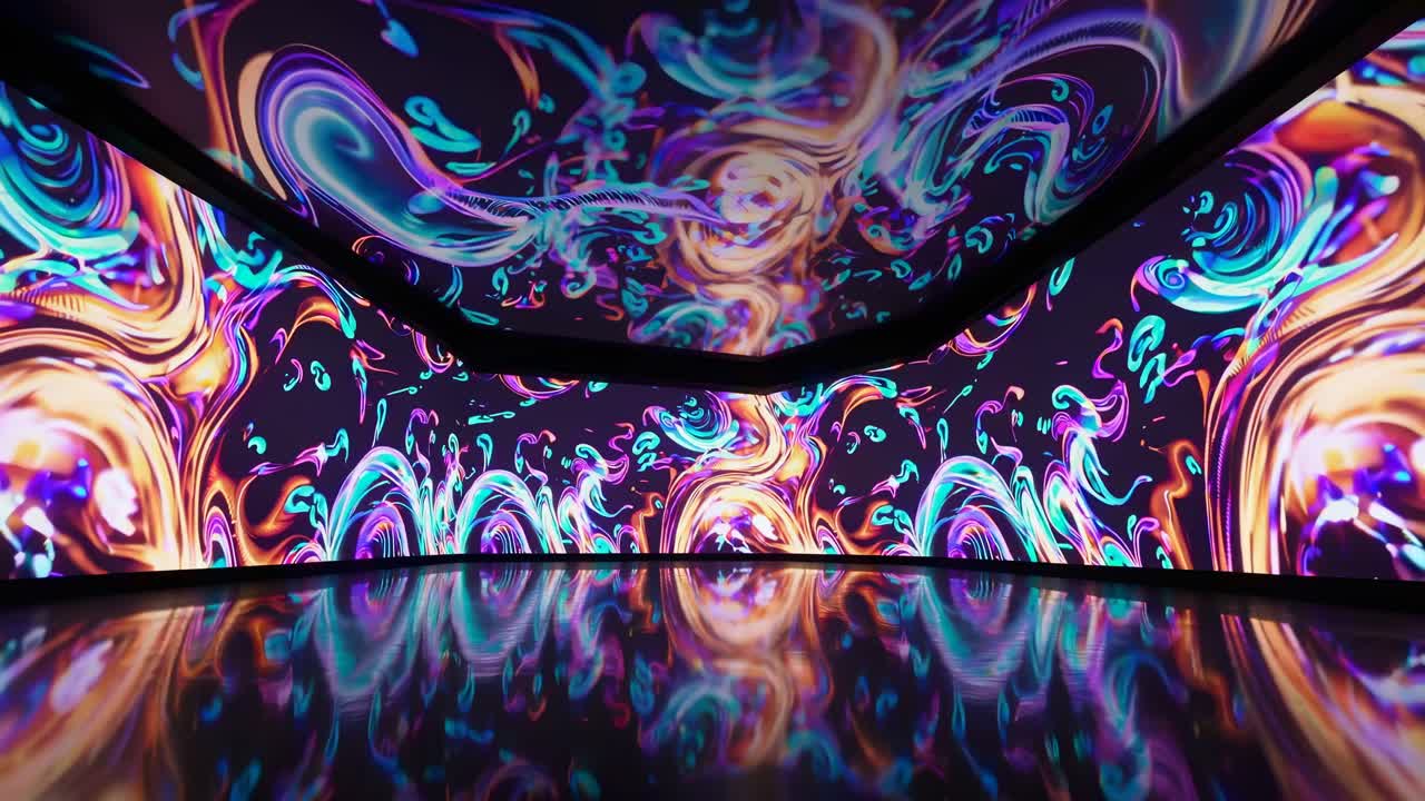 Immersive video art installation with swirling neon patterns on walls and floor