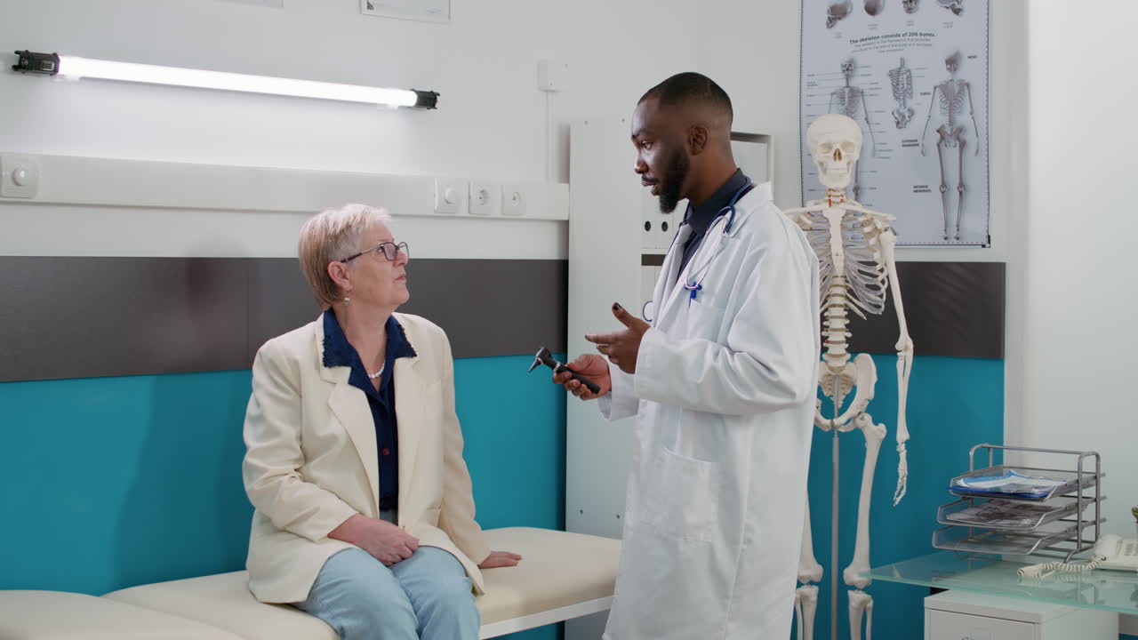 Doctor examining patient in clinic