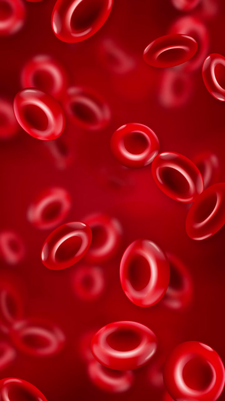 Red blood cells fall vertically through a deep red background with soft bokeh lighting.