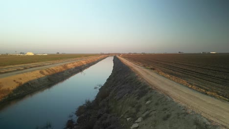 the drone ascends over lake tulare, offering a view of fertile farmlands, earthy textures, and the region’s rural beauty in vivid detail.