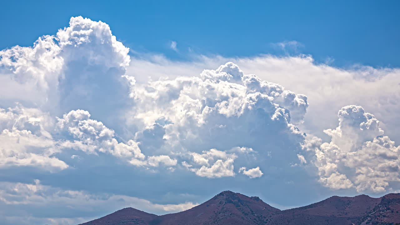 Majestic Cumulus Clouds over Mountains