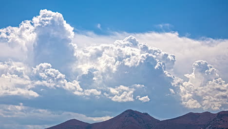 majestic cumulus clouds over mountains