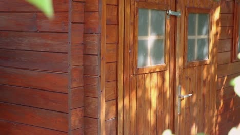 slow pan of a barn-shed in the backyard