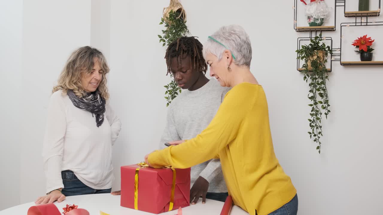 People Wrapping a Gift