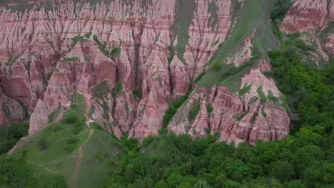 fantastic aerial view of the pink rapa rosie mountain in romania