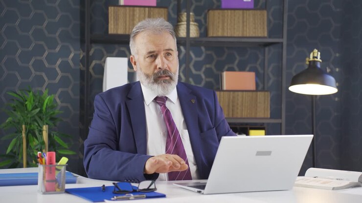 Businessman having a heart attack.