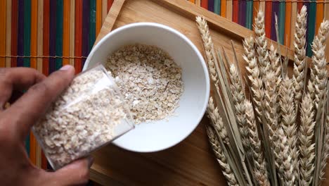 preparing oatmeal with oats and wheat