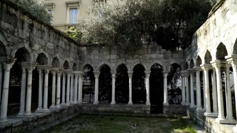 ancient cloister ruins in a city