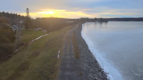 aerial-drone-following-a-young-woman-on-a-winter-day