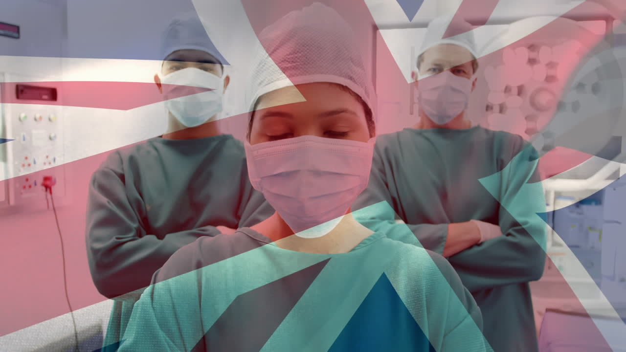 animación de la bandera del reino unido sobre un grupo de médicos con máscaras faciales