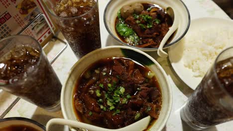 beef and vegetables with rice and soda