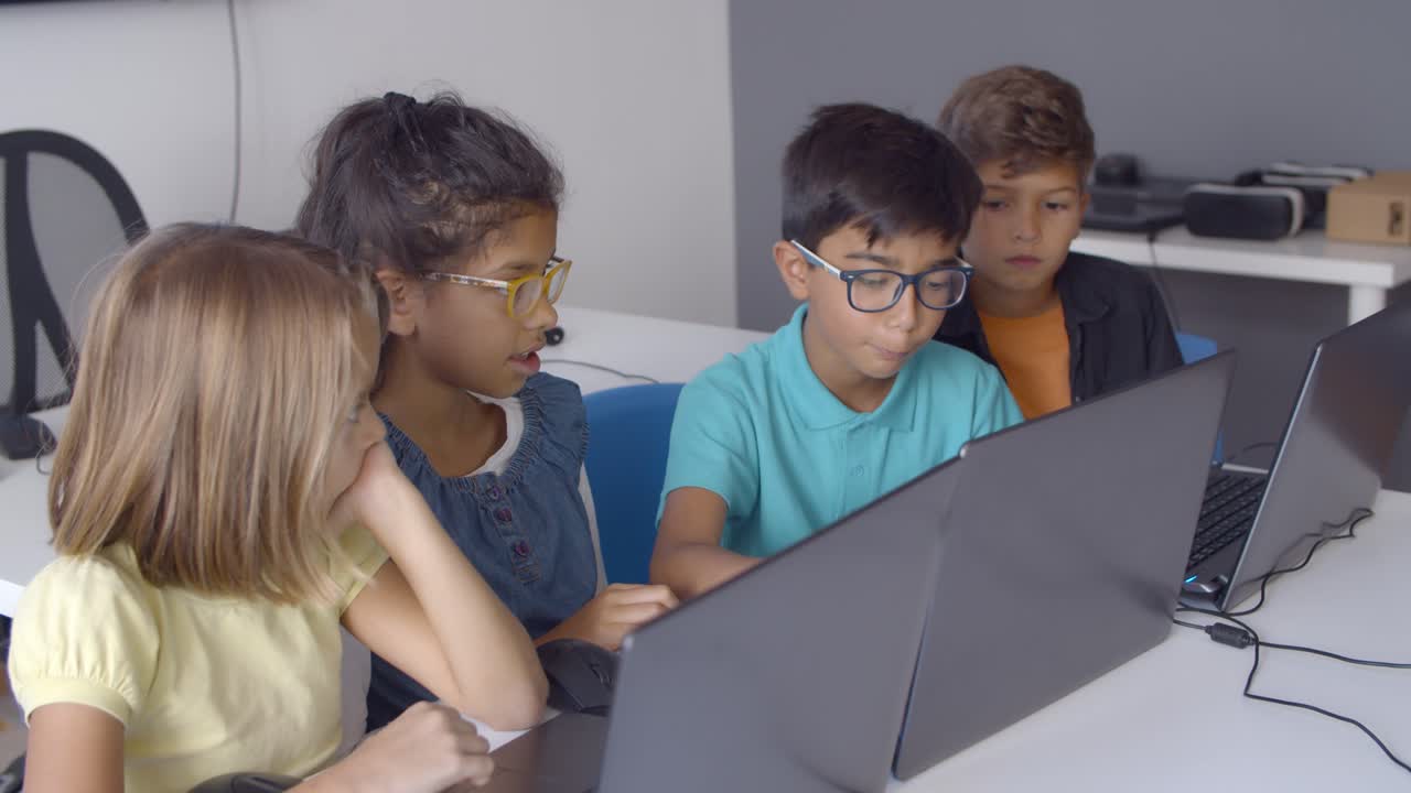 Team of pupils working on task together