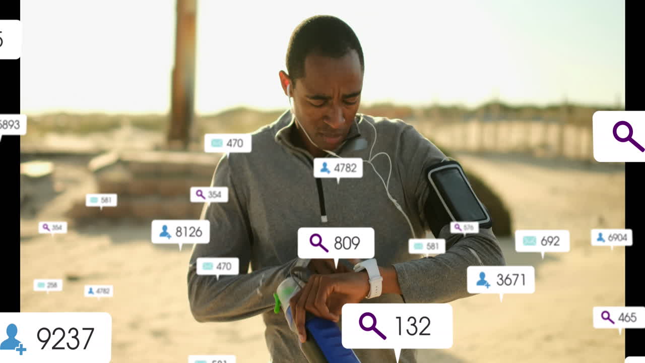 Animation of notification bars, biracial man adjusting phone on arm and using smartwatch