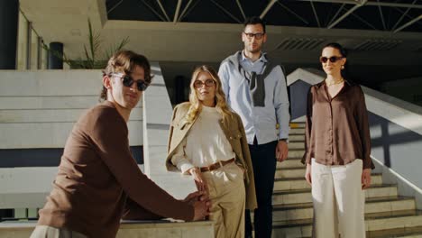 stylish group portrait on stairs