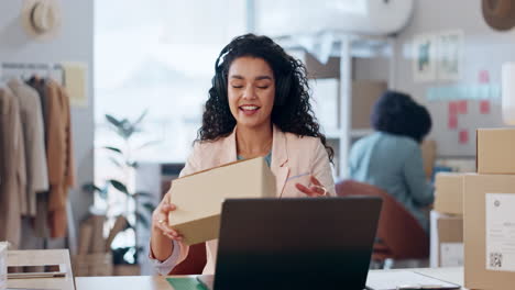 Boxes,-video-call-and-woman-with-a-laptop