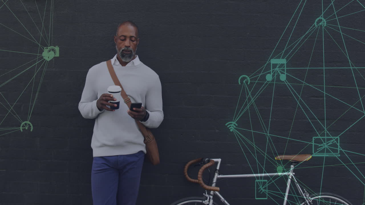 Animation of networks with digital icons over african american man using smartphone in city
