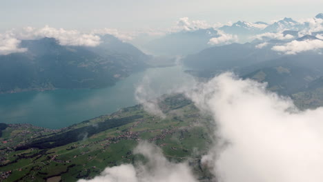 high above the clouds: aerial panorama of lake thun, switzerland