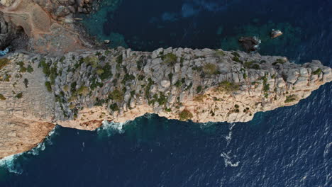 Stunning-Aerial-Top-View-Of-Cova-De-Sa-Foradada-In-Deia,-Balearic-Islands,-Spain