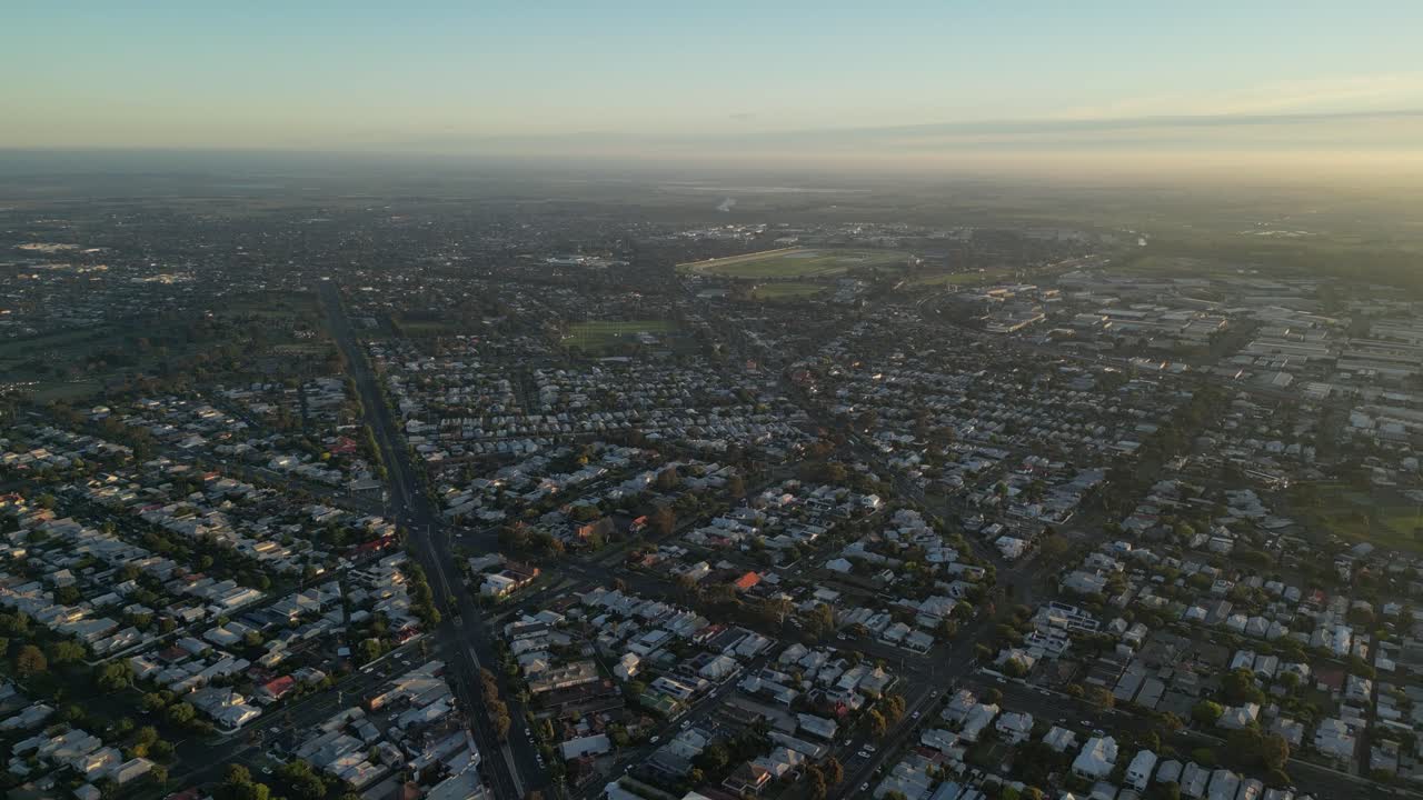 Panoramic Aerial View of a Suburban Landscape at Golden Hour