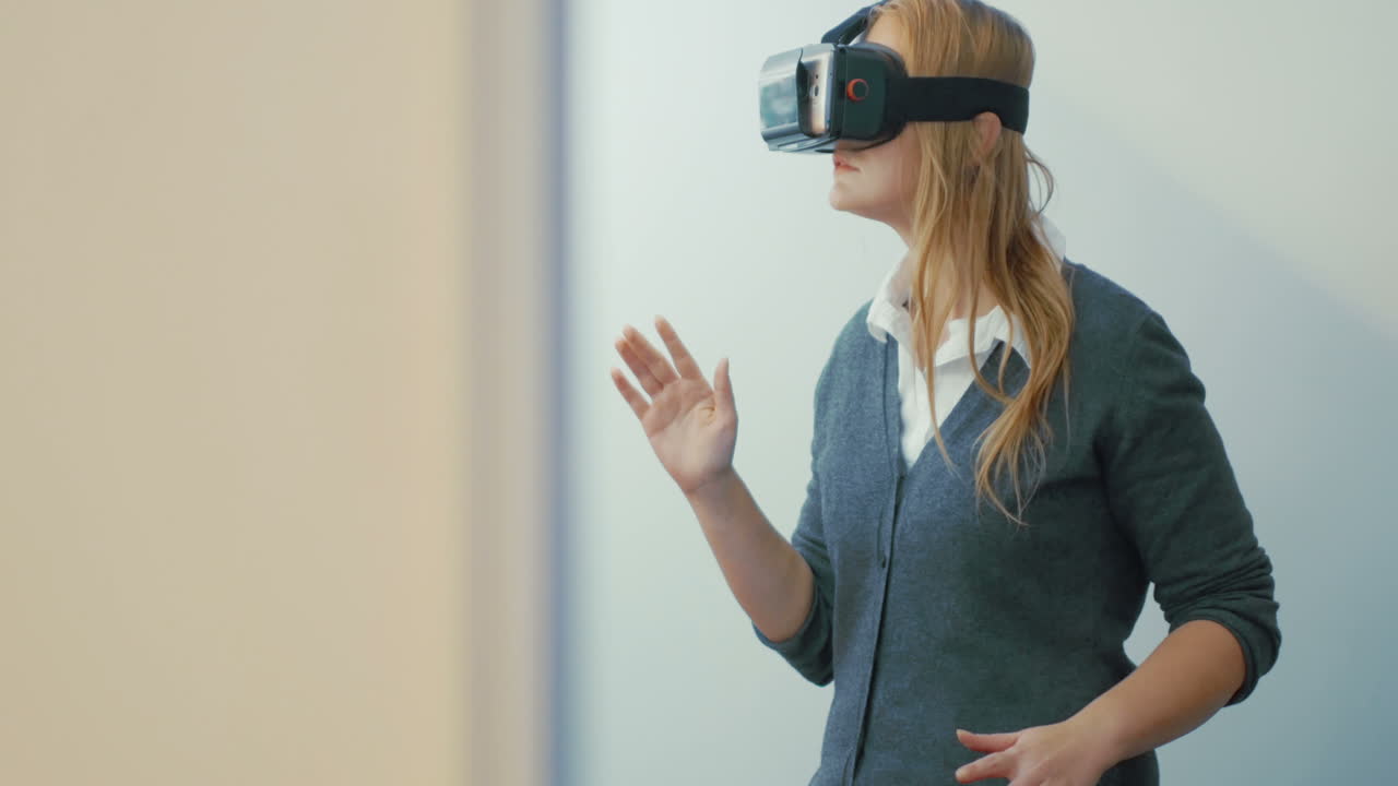 Woman entertaining with VR-headset for mobiles