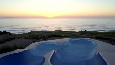 coastal sunset with skatepark and friends