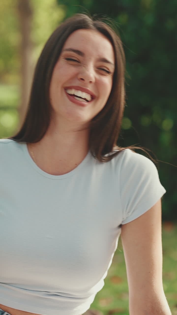 Portrait of a Smiling Brunette Woman Outdoors