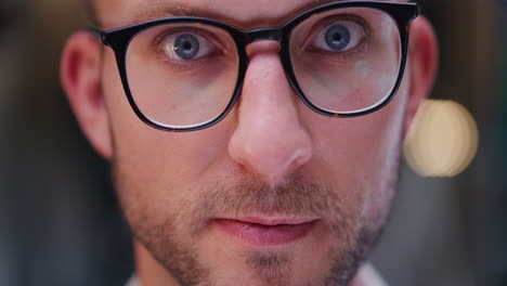 close-up of businessman's face looking at camera