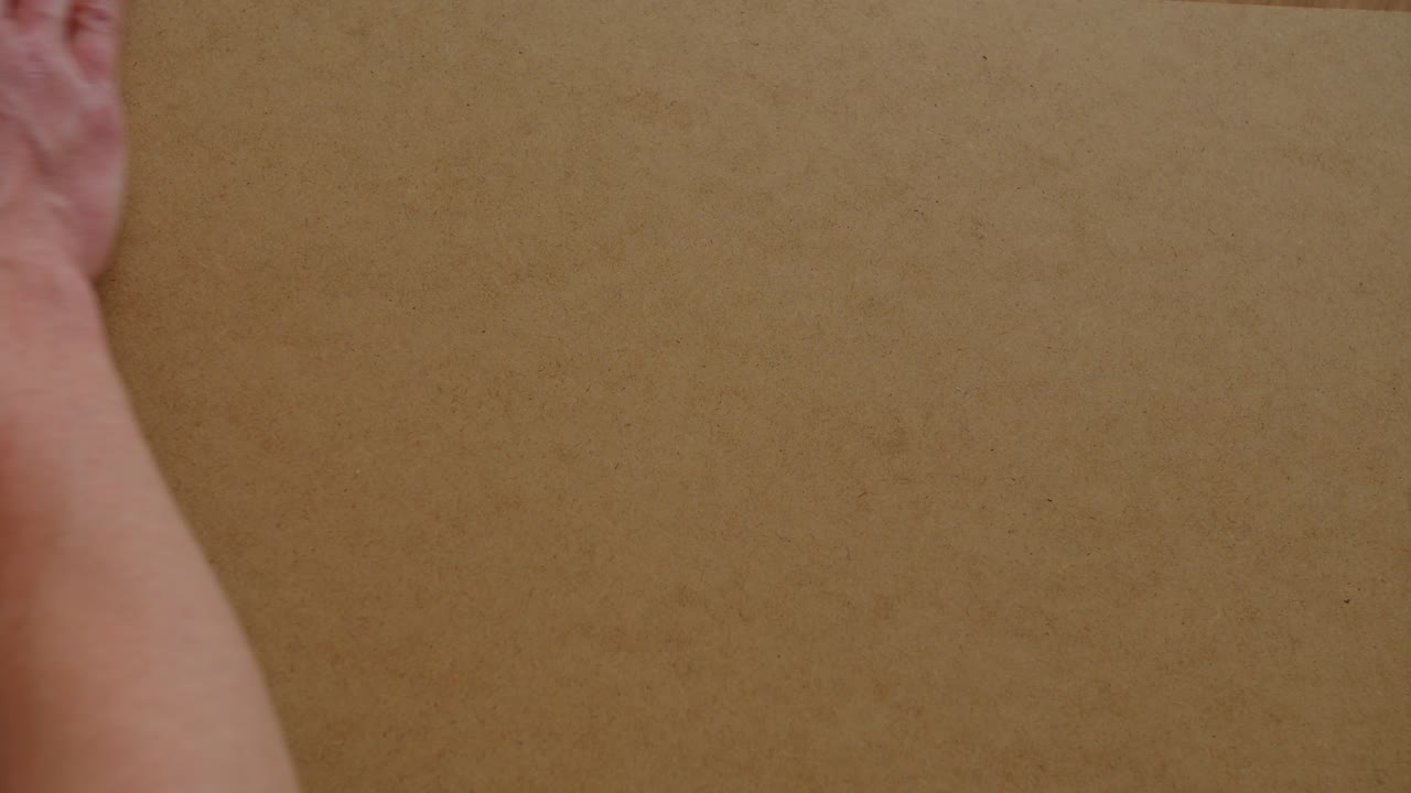 Assorted Hardware Components for Furniture Assembly Spread on a Table Top View 4K