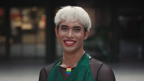 portrait of a smiling transgender man