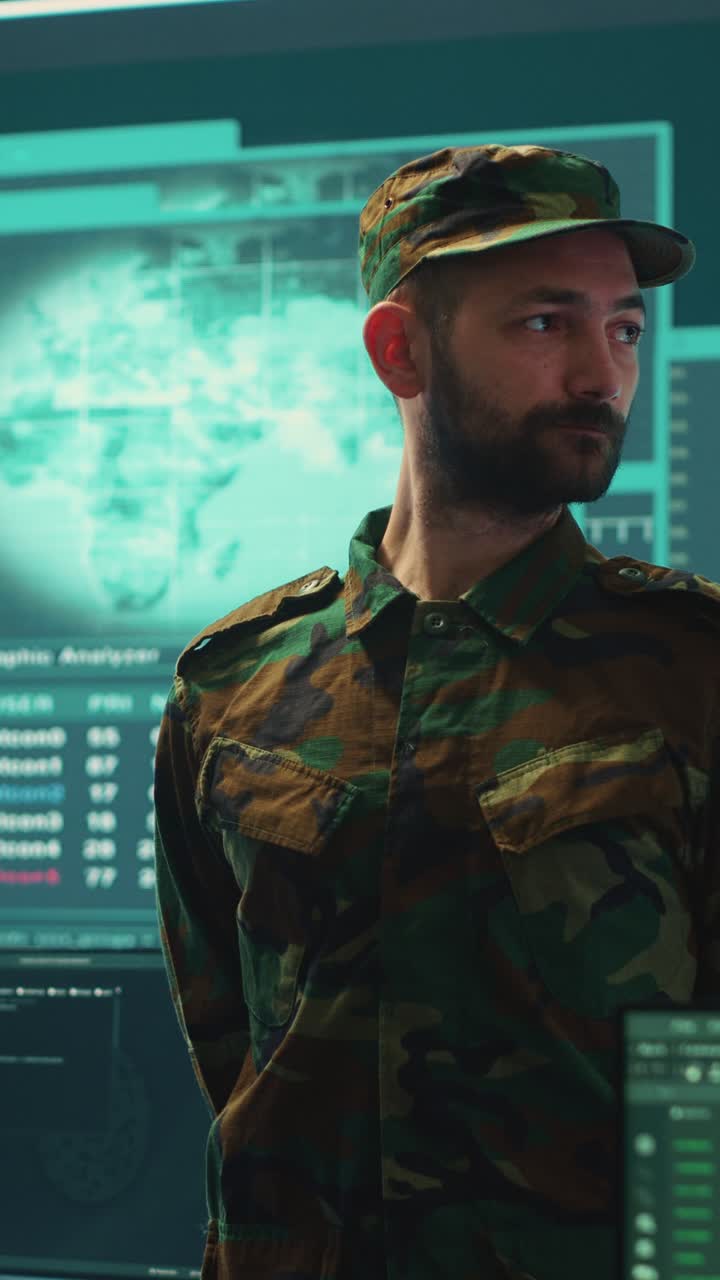 Man in Military Uniform Standing in a High-Tech Control Room