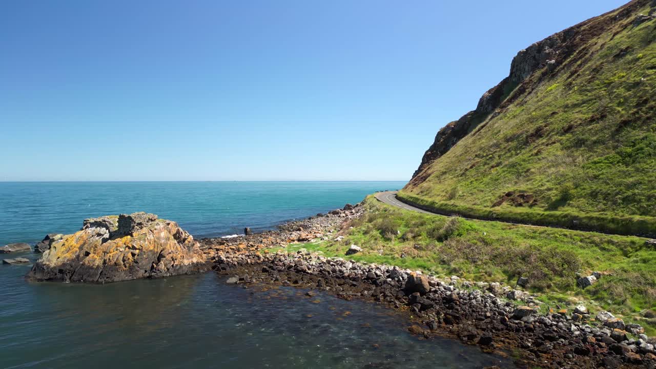 Aerial video of the Causeway Coastal Route on a bright and sunny day. Filmed in Ballygally in 4K, 60FPS and with Rec800 color.