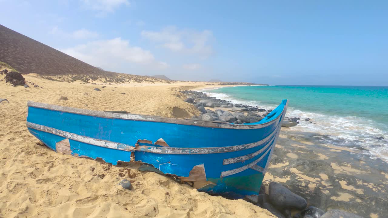 Wooden Blue Boat Dock At Playa Las Conchas Beach In La Graciosa, Canary Islands, Spain.  wide shot