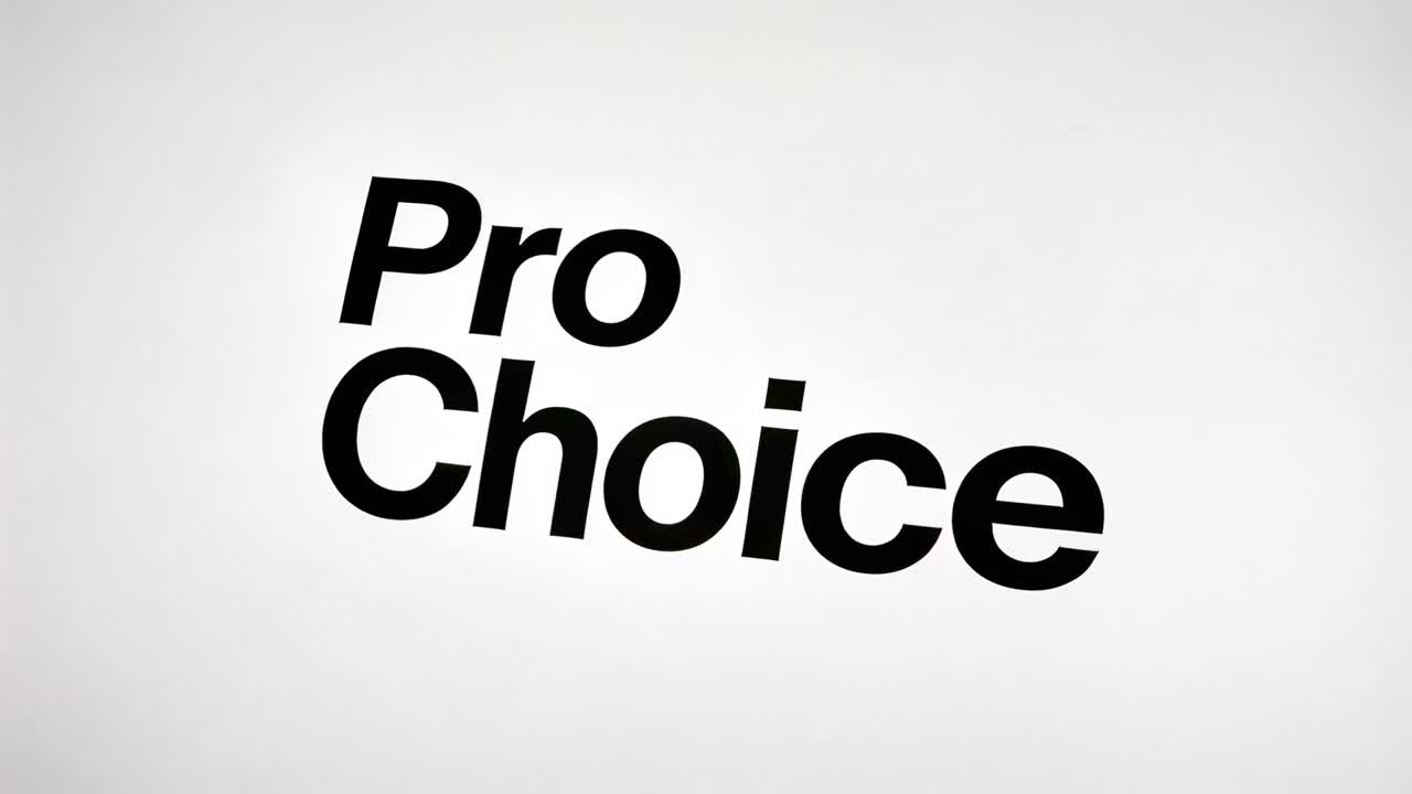 Starting timeline animating black bold sans-serif Pro Choice title scaling to center on grey stage