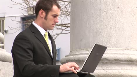 Stock-Footage-of-Businessman-Working-Outdoors