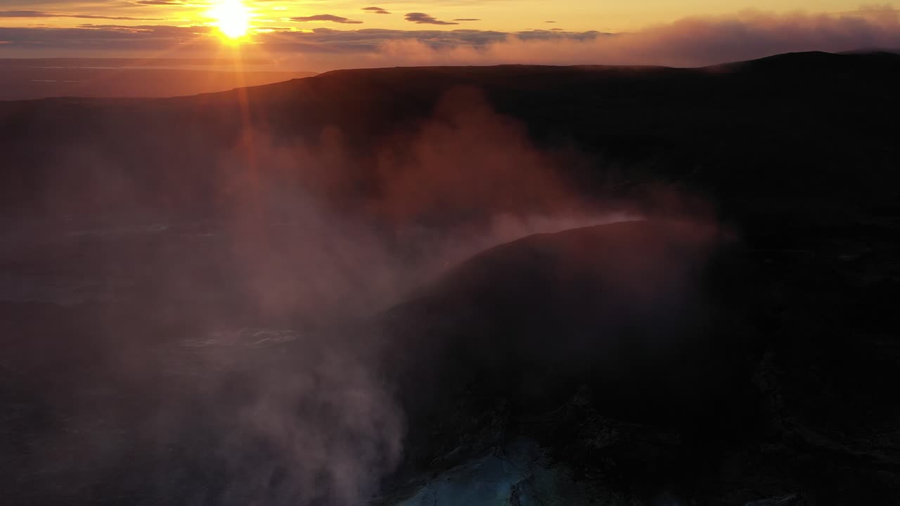 Volcanic Sunset Over Mountain Range