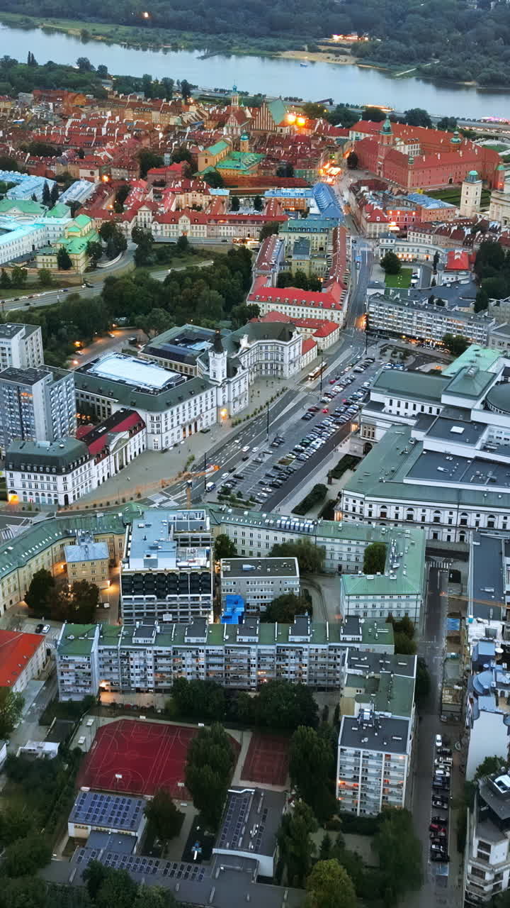 Aerial drone view of Warsaw, Poland on the River Vistula in the evening. Vertical vertical